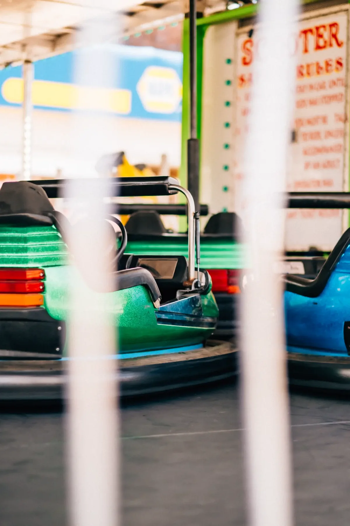 Exit sign at a carnival bumper-car ride.